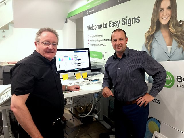 David Crowther with Easy Signs' Mark McInnes